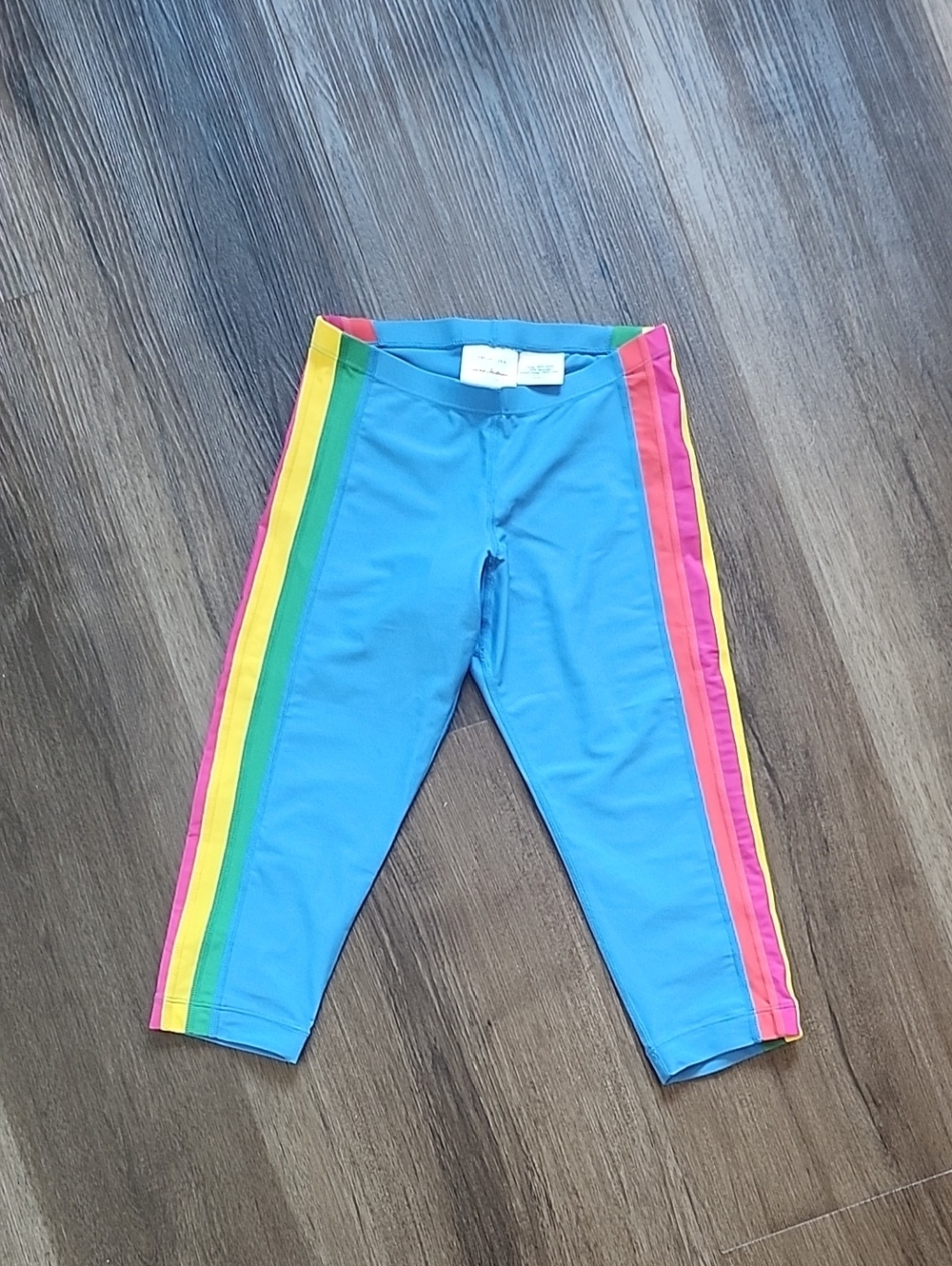 Hanna Andersson Blue Capri Leggings Or Swim Bottom with Rainbow Side Stripes